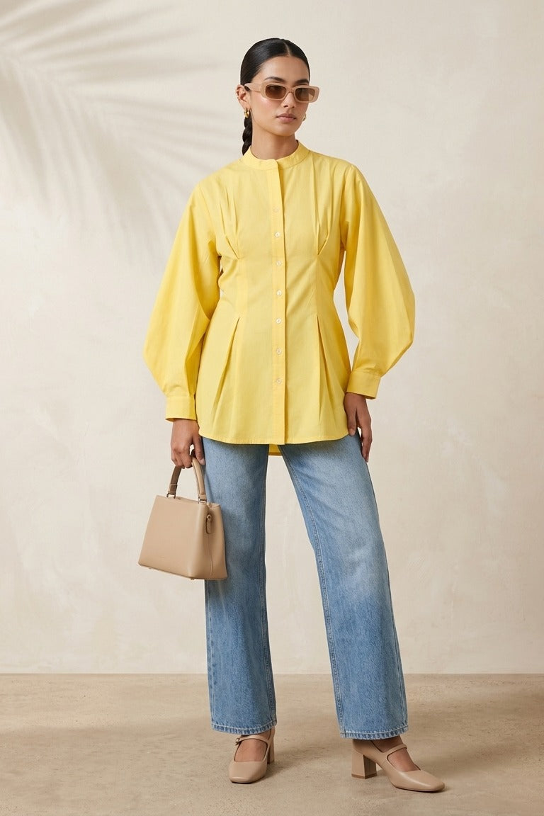 Yellow Bishop Sleeve Fitted Kurti by Swayra, worn with wide-leg jeans and block heels