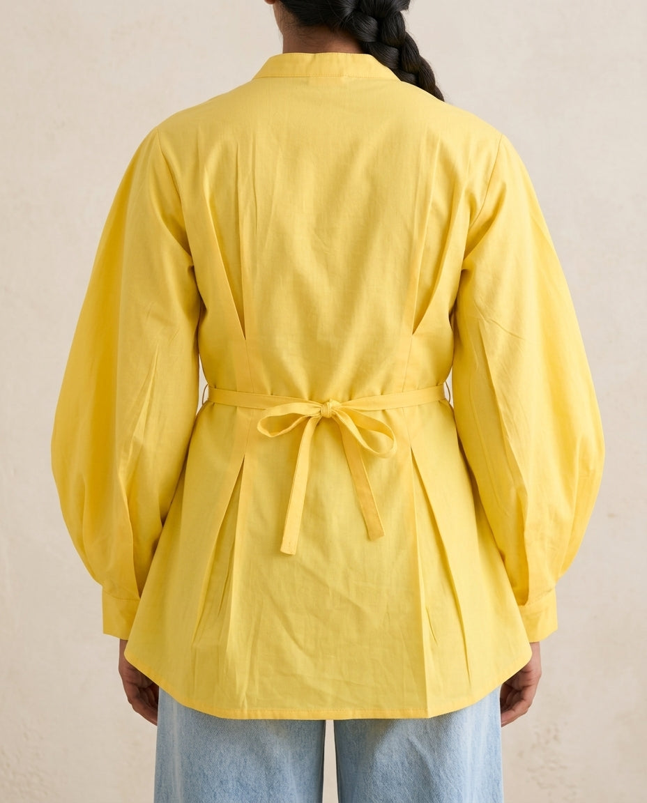 Back view of Swayra Yellow Bishop Sleeve Kurti showing adjustable self-tie bow at waist