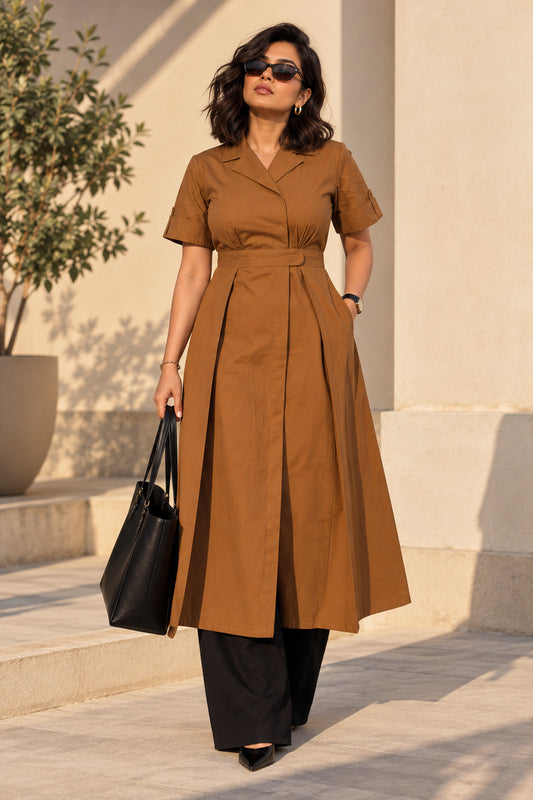 Chestnut brown pleated wrap kurta, full front view, blazer-style collar and waistband, styled with black wide-leg trousers