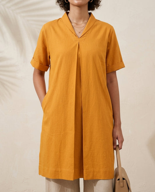 Swayra Mustard Box Fit Kurta, close-up of front box pleat, side pocket and short sleeves