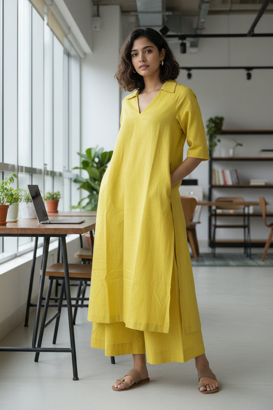 Full length view of solid yellow collared kurta set with matching pants for office wear