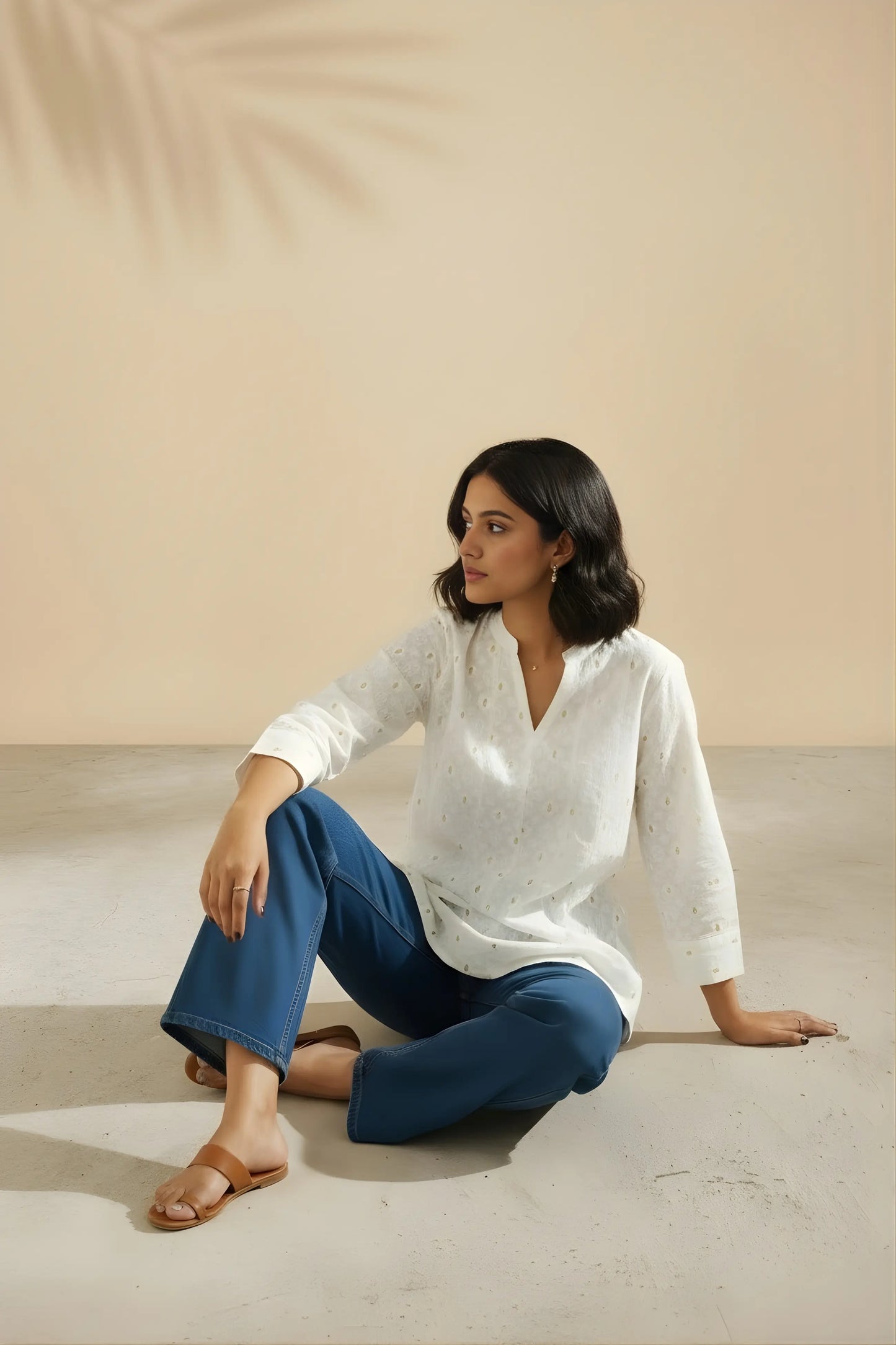 White khadi kurta sitting pose showing comfortable fabric