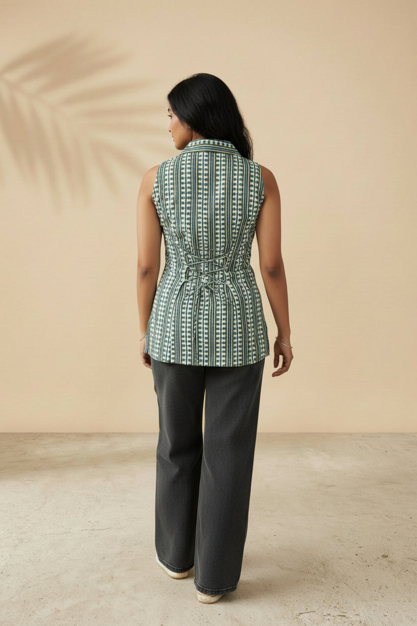 Back view of blue geometric print short kurti showing adjustable corset tie-up detail